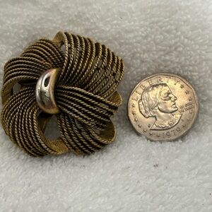 Elegant Twisted Gold tone Moden design. Marked HAR on back